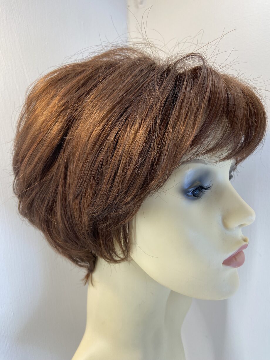Superior reddish brown wig. Rss691