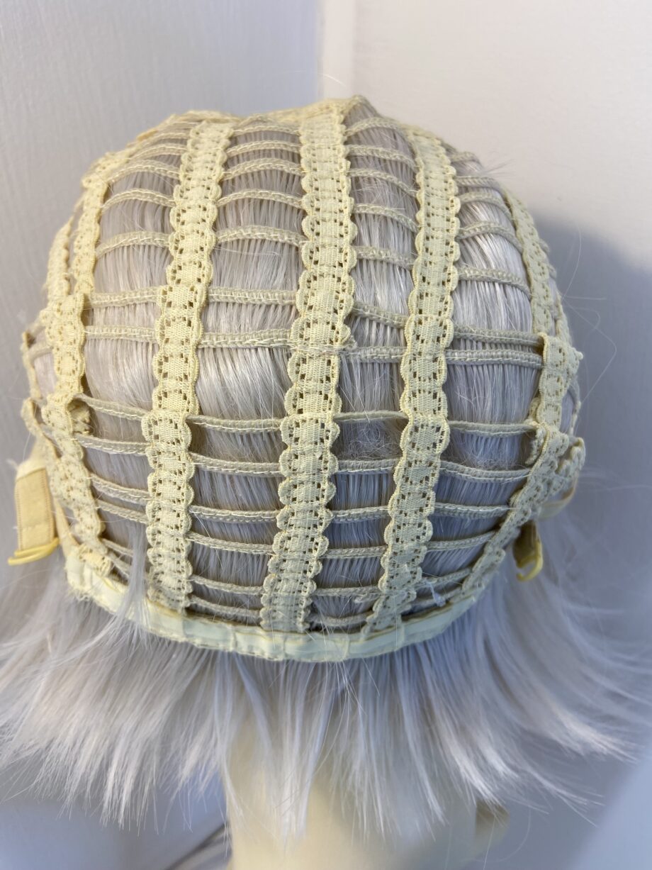New white rooted mid length wig. Wms172